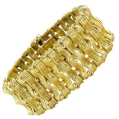 Sarl Baume 19th Century French Chiseled Gold Ribbon Bracelet