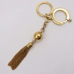 ELADY LOUIS VUITTON Portocre Swing Keychain M65997 Metal Gold Keyring Bag Charm -Best Jewelry Store 2000 7d488a8f 28f8 4659 be0d 19d176136a49
