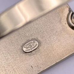 Opherty Ciocci CHANEL Vintage Silver Metal Beige Enamel Mademoiselle Bangle Bracelet 10 Opherty Ciocci CHANEL Vintage Silver Metal Beige Enamel Mademoiselle Bangle Bracelet -Best Jewelry Store 8fe0e7de 6e38 5ab5 b486 e701c9a81df0