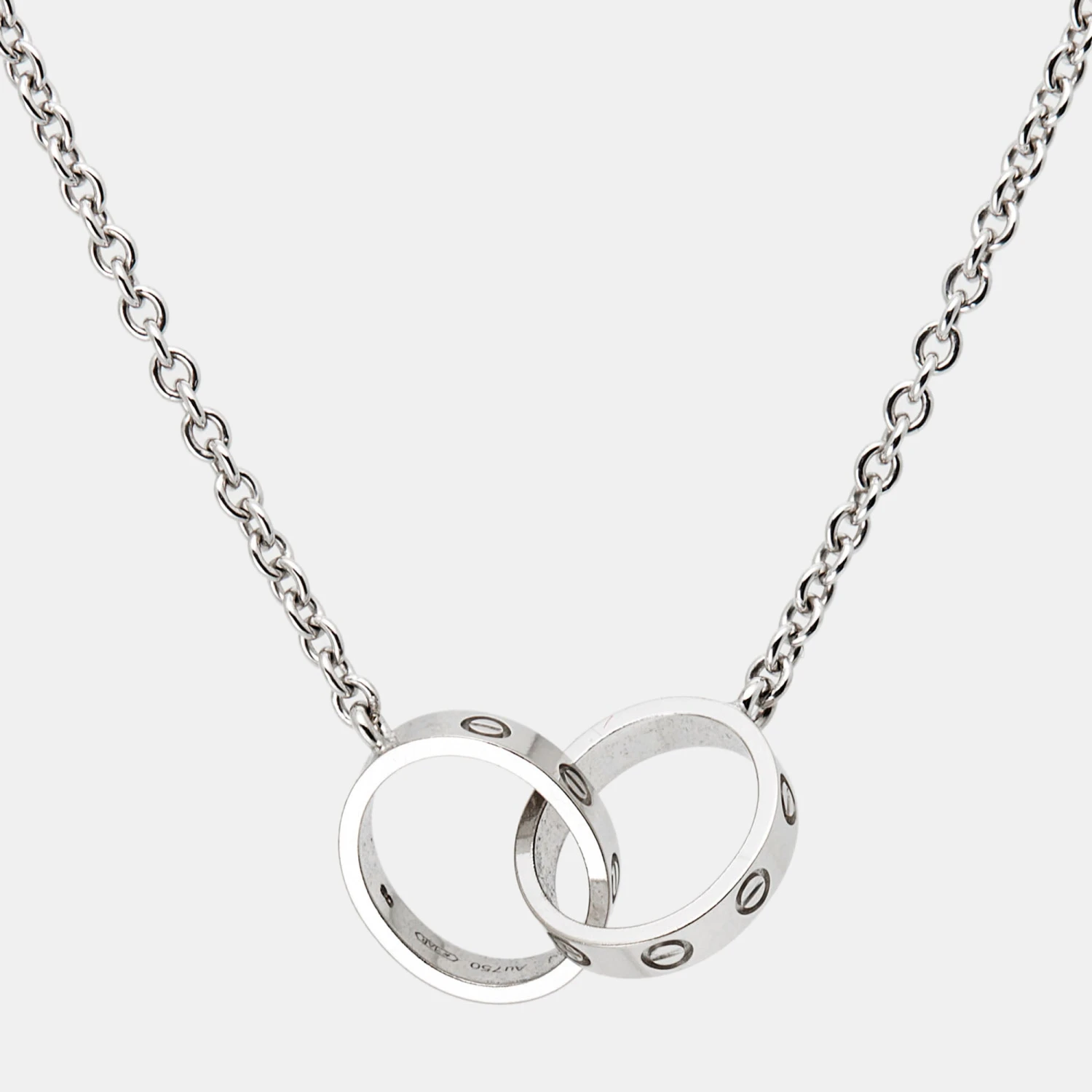 The Luxury Closet CARTIER Love Interlocking Loops 18k White Gold Bracelet 4 The Luxury Closet CARTIER Love Interlocking Loops 18k White Gold Bracelet - Image 2