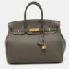 The Luxury Closet Hermès Etain Togo Leather Gold Finish Birkin 35 Bag 1 The Luxury Closet Hermès Etain Togo Leather Gold Finish Birkin 35 Bag -Best Jewelry Store luxury women hermes used handbags p769703 043