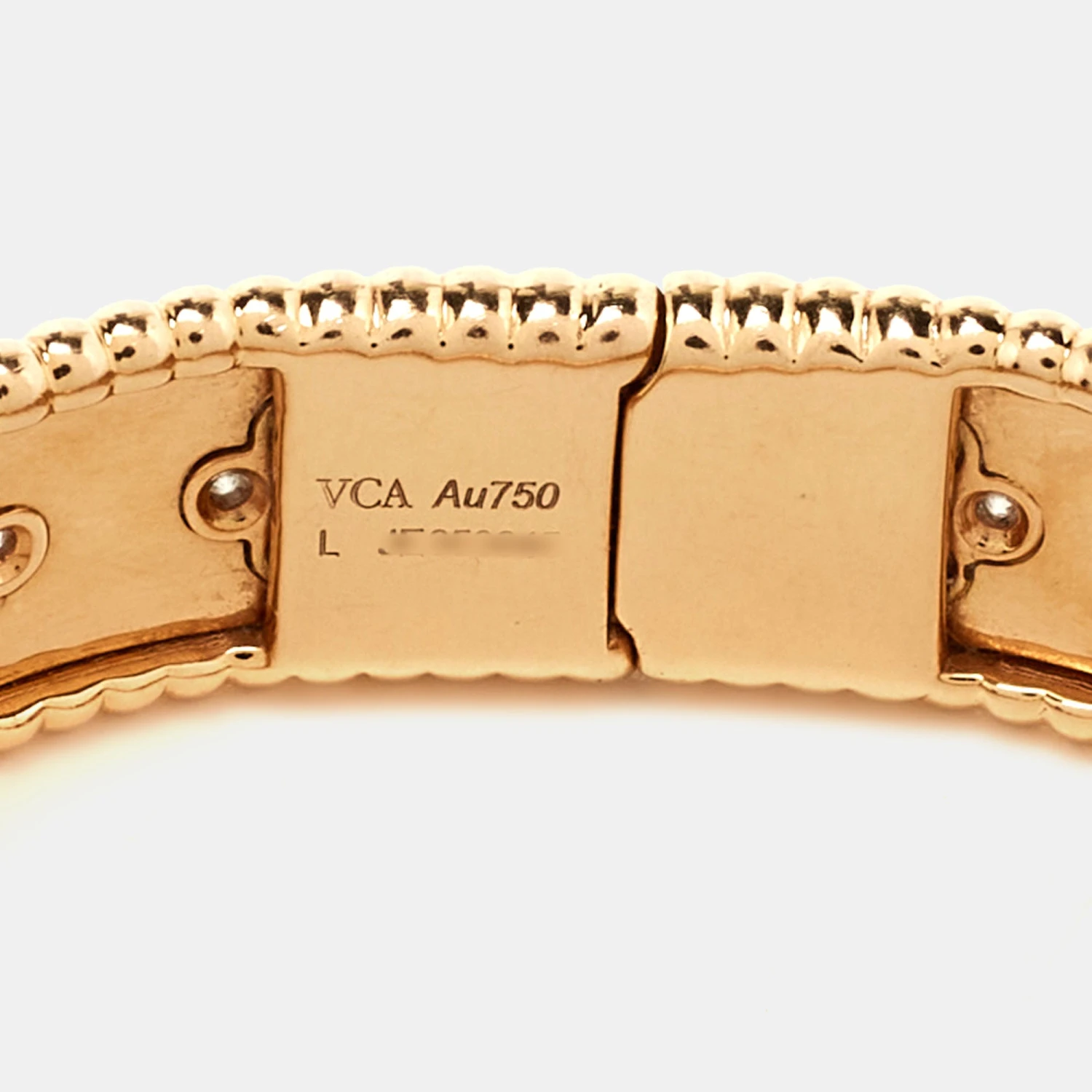 The Luxury Closet Van Cleef & Arpels Perlee Clovers Diamond 18k Rose Gold Medium Model Bracelet L 7 The Luxury Closet Van Cleef & Arpels Perlee Clovers Diamond 18k Rose Gold Medium Model Bracelet L - Image 5