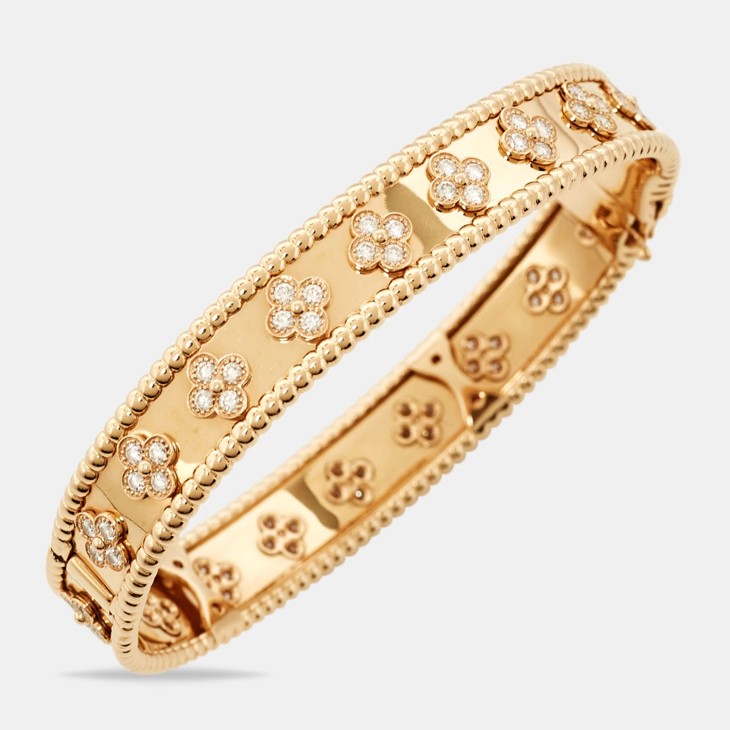 The Luxury Closet Van Cleef & Arpels Perlee Clovers Diamond 18k Rose Gold Medium Model Bracelet L 5 The Luxury Closet Van Cleef & Arpels Perlee Clovers Diamond 18k Rose Gold Medium Model Bracelet L - Image 3