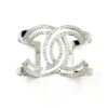 Lar Vintage CHANEL Classic Silver CC Square Round Crystal Cutout Double Cuff Bracelet